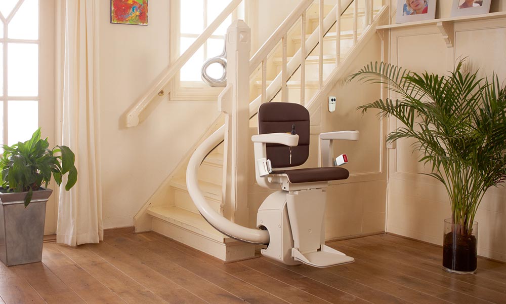Single rail curved stairlift with 180 degree parking.