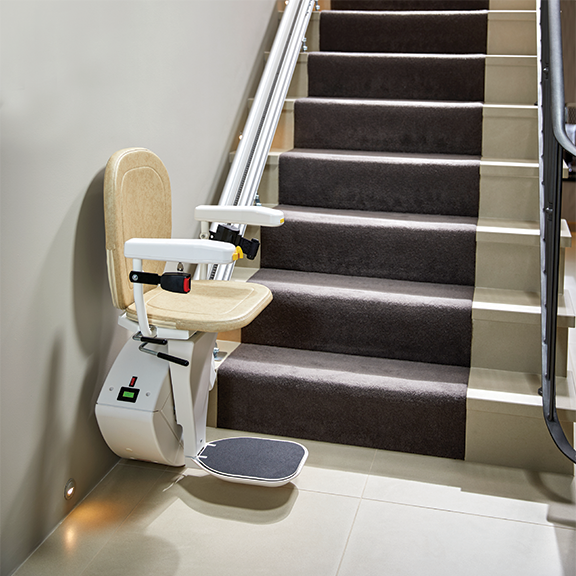 Straight stairlift at the foot of the stairs with Which Stairlift